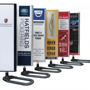 Six aligned custom totems with composite wheel bases